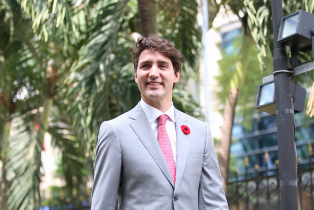 Thủ tướng Canada Justin Trudeau gõ chiêng tại sàn chứng khoán - Ảnh 6.