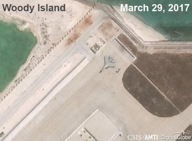 Trung Quốc xác nhận triển khai chiến đấu cơ ra đảo Phú Lâm - Ảnh 1.