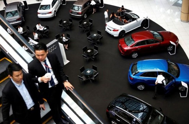 Singapore hạn chế sự gia tăng xe máy và xe ôtô tư nhân từ 2018 - Ảnh 1.
