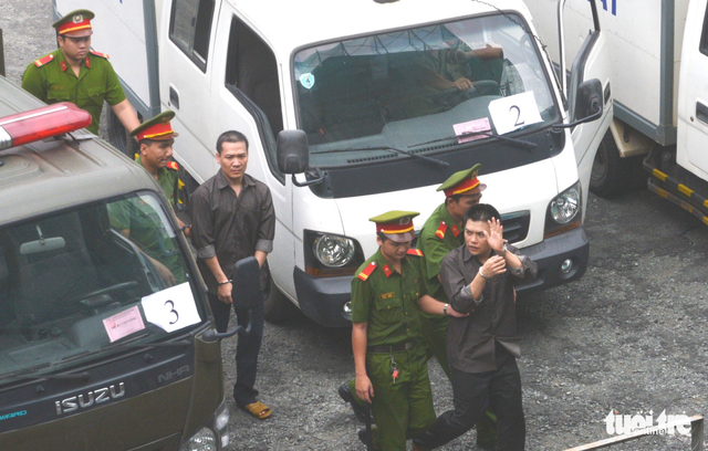 Nhóm đánh bom sân bay Tân Sơn Nhất lãnh án nặng - Ảnh 1.