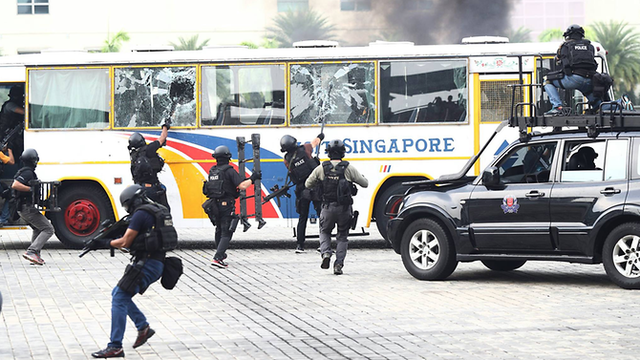 Singapore cấm quay phim, chụp ảnh tại hiện trường khủng bố - Ảnh 1.