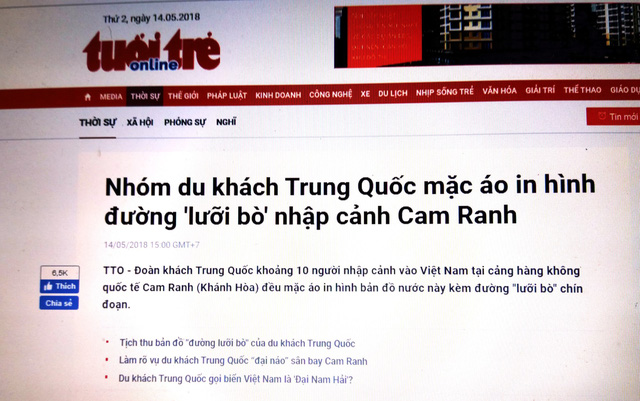 Du khách Trung Quốc mặc áo khoác che giấu bản đồ lưỡi bò khi nhập cảnh - Ảnh 1.