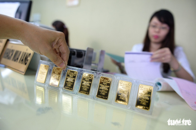 Giá vàng vọt lên hơn 37 triệu đồng do Mỹ - Trung đại chiến? - Ảnh 1. Giá vàng vọt lên hơn 37 triệu đồng do Mỹ - Trung đại chiến? - Ảnh 1.