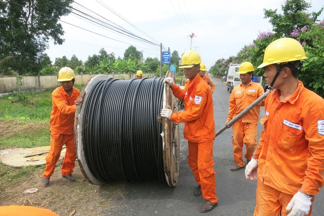 EVN SPC tăng cường củng cố lưới điện trước mùa mưa bão - Ảnh 1.