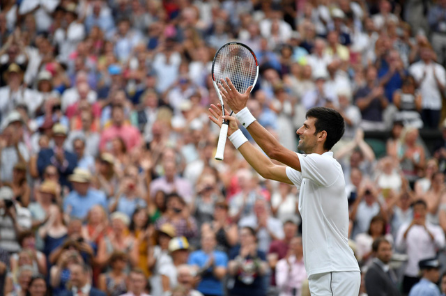 Djokovic đánh bại Nadal ở trận bán kết Wimbledon vắt qua hai ngày - Ảnh 1.