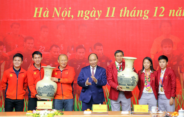 Thủ tướng đón các nhà vô địch: Đây là chiến thắng của tinh thần Việt Nam  - Ảnh 4.