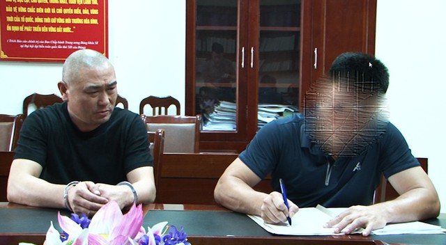 Bị truy nã ở Trung Quốc, dạt sang Việt Nam bị bắt trong khách sạn - Ảnh 1.