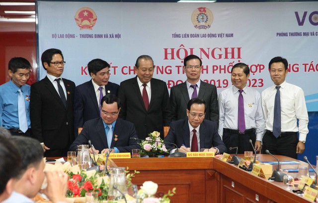Nhiều chương trình hợp tác bảo vệ người lao động, doanh nghiệp - Ảnh 1.