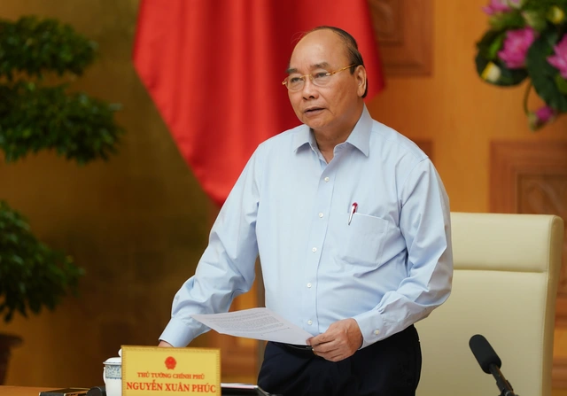 Thủ tướng: Cả thế giới suy thoái nặng nề, kinh tế Việt Nam trên đà hồi phục - Ảnh 1.
