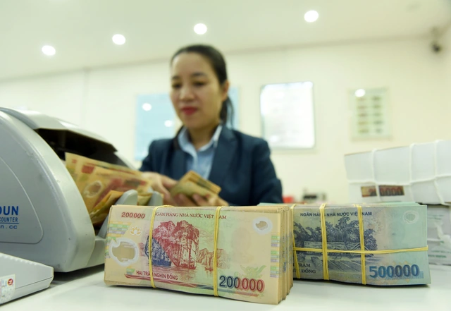 ‘Tăng trưởng kinh tế 2020 của VN dự báo thấp nhất trong vòng vài chục năm - Ảnh 1.
