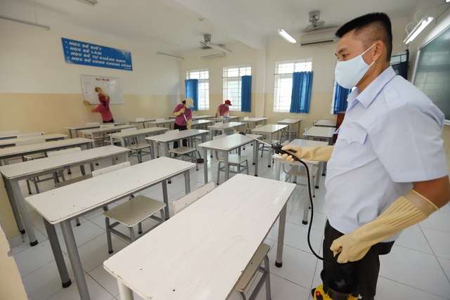 Thí sinh có phải đeo khẩu trang khi làm bài thi? - Ảnh 1.