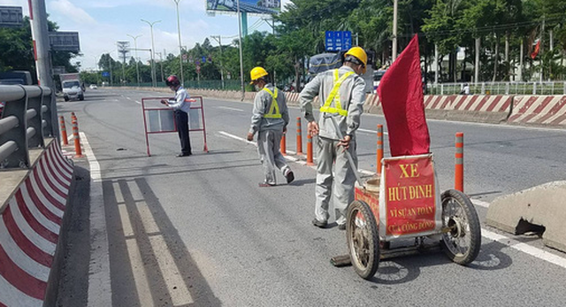 Giữa dịch vẫn quét cả 1 ký đinh chỉ trên 100m quốc lộ 1 - Ảnh 2.