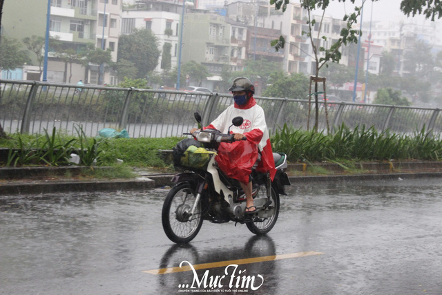 TP.HCM mưa to nhiều nơi, kéo dài đến khi nào?- Ảnh 1.