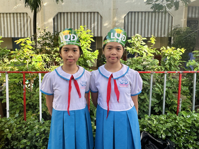 Hai chị em song sinh cùng vào chung kết Giải Lê Quý Đôn trên ấn phẩm Nhi Đồng TP.HCM- Ảnh 1.
