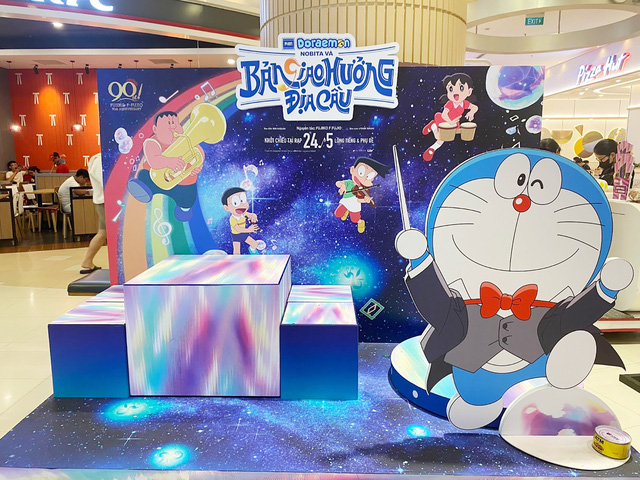 Nhạc sĩ Doraemon biểu diễn khắp đường phố TP.HCM- Ảnh 3.