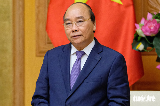 Chủ tịch nước Nguyễn Xuân Phúc thôi giữ chức ủy viên Bộ Chính trị, ủy viên Trung ương Đảng khóa XIII - Ảnh 1.