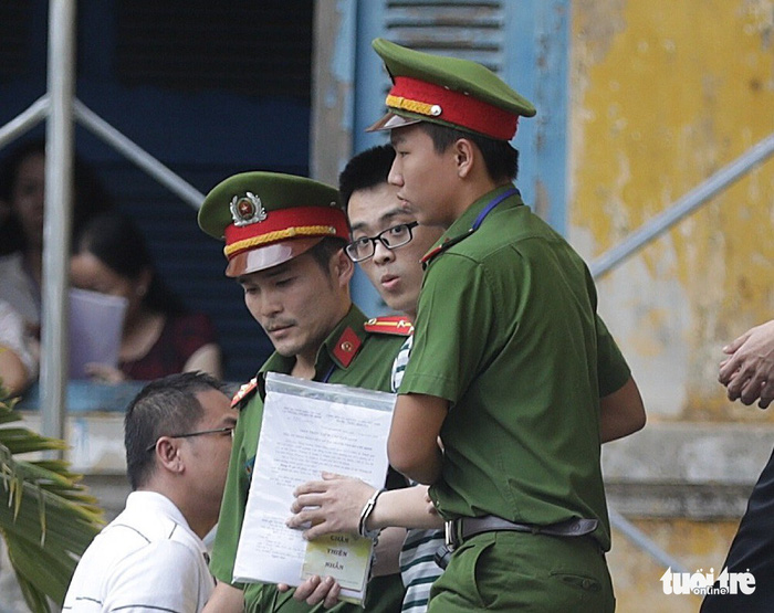 Y án sơ thẩm với nhóm khủng bố sân bay Tân Sơn Nhất - Ảnh 4.