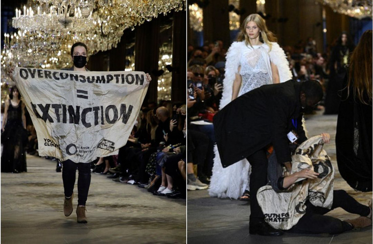 Người biểu tình đi catwalk trên sàn diễn ở Tuần lễ thời trang Paris