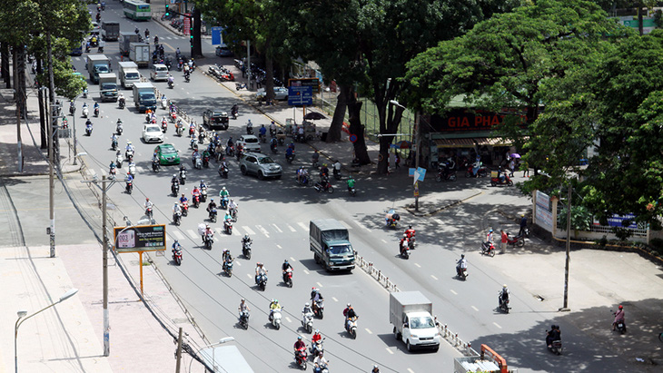 Khởi công mở rộng đường Hoàng Minh Giám - Ảnh 1.