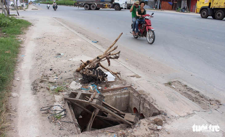 Những cạm bẫy chết người giữa phố ở Bình Dương - Ảnh 11.