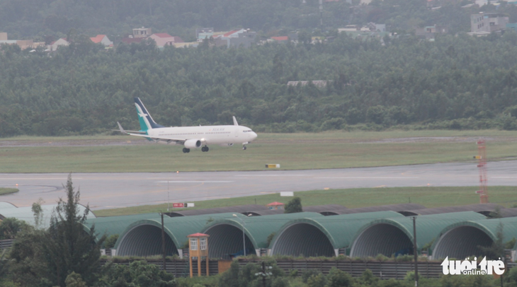 Máy bay chở giám đốc điều hành Ban thư ký APEC tới Đà Nẵng - Ảnh 1.