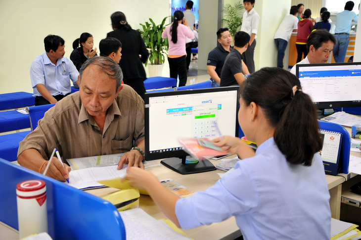 Dân Đồng Nai gọi tổng đài là có người đến nhà làm hồ sơ - Ảnh 3.