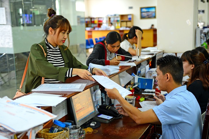 Nhiều người lao động xin nghỉ và muốn nhận một cục - Ảnh 1. Nhiều người lao động xin nghỉ và muốn nhận một cục - Ảnh 1.