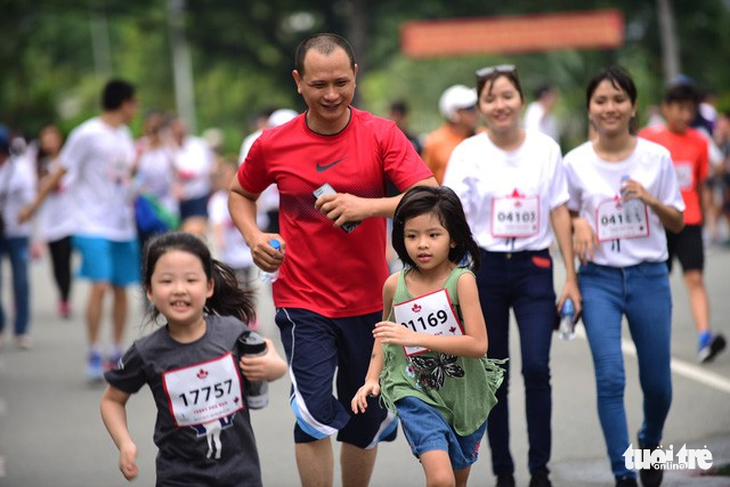 Gần 20.000 người tham gia chạy bộ từ thiện tại TP.HCM - Ảnh 9.