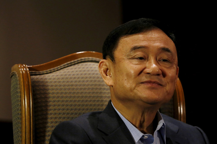 Thái Lan muốn xử vắng mặt cựu Thủ tướng Thaksin - Ảnh 1.