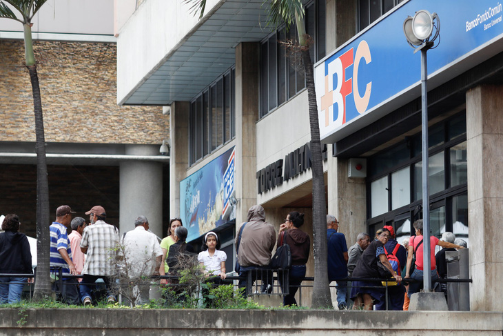 Venezuela vừa bị hãng S&P tuyên bố vỡ nợ - Ảnh 1.