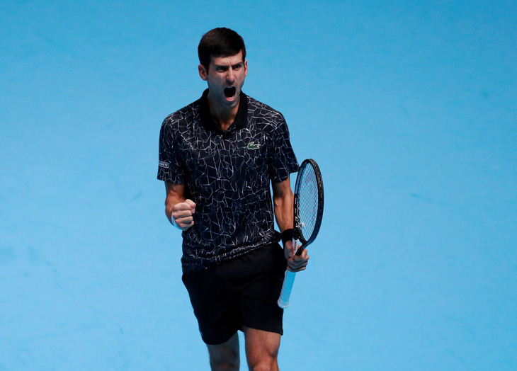 Djokovic thắng dễ Isner ở trận ra quân ATP Final 2018 - Ảnh 1.
