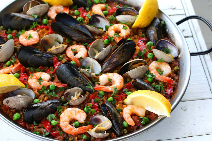 Ghé Tây Ban Nha đừng quên ăn thử cơm paella - Ảnh 2.