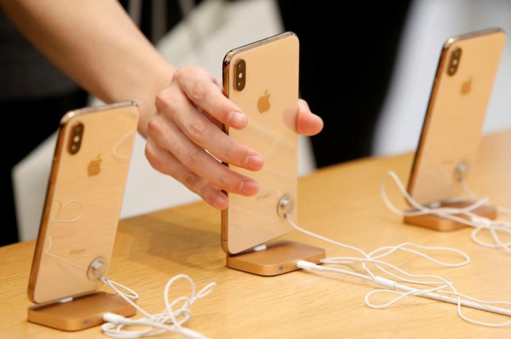 Apple: Trung Quốc sẽ chịu thiệt hại khi cấm bán iPhone - Ảnh 1.