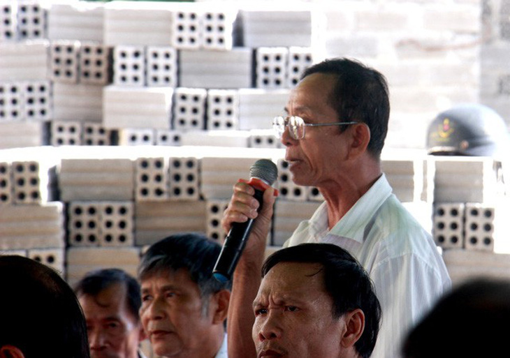 Dân giữ người để phản đối dự án điện mặt trời tại Bình Định - Ảnh 1.