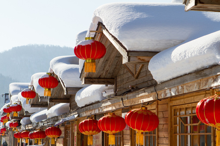 Ngôi làng tuyết trắng đẹp như trong cổ tích ở Cáp Nhĩ Tân - Ảnh 1.