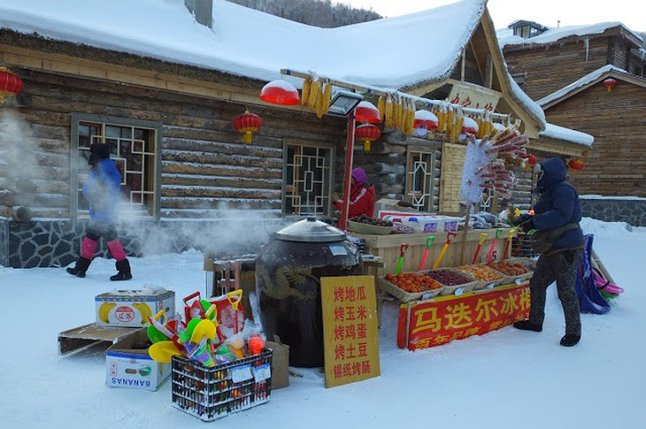 Ngôi làng tuyết trắng đẹp như trong cổ tích ở Cáp Nhĩ Tân - Ảnh 5.