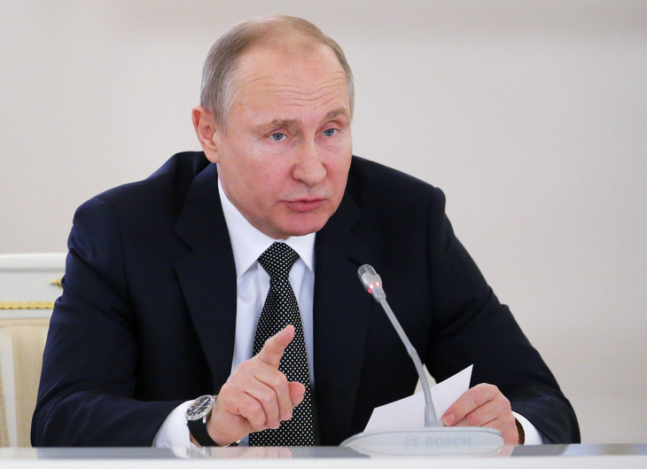 Tổng thống Putin chuẩn bị lò để đốt củi - Ảnh 1.