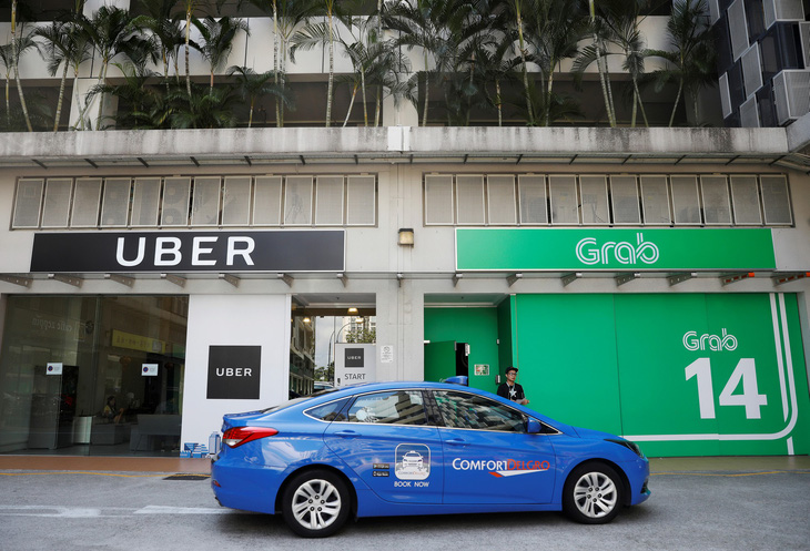Uber sáp nhập vào Grab, dân Singapore nói không có lợi - Ảnh 1.