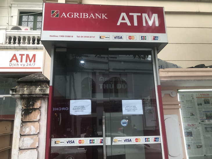 Để không bị hack thẻ ngân hàng khi rút tiền từ cây ATM - Ảnh 1.