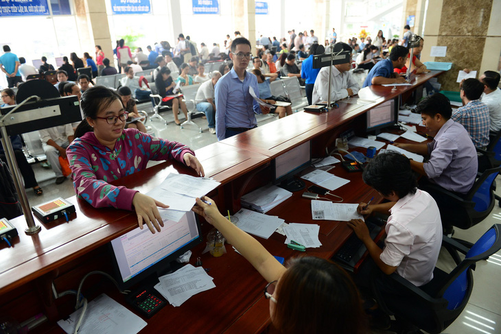 Ngành thuế làm việc xuyên Tết - Ảnh 1.