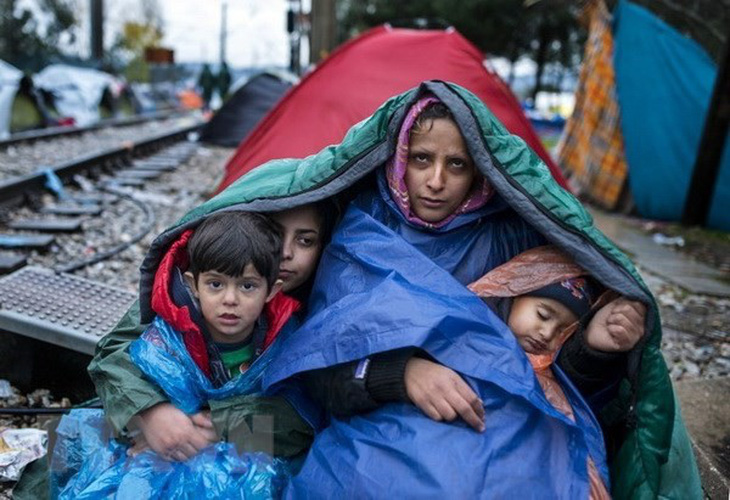 OECD: Cuộc khủng hoảng người di cư năm 2017 tạm lắng dịu - Ảnh 1.