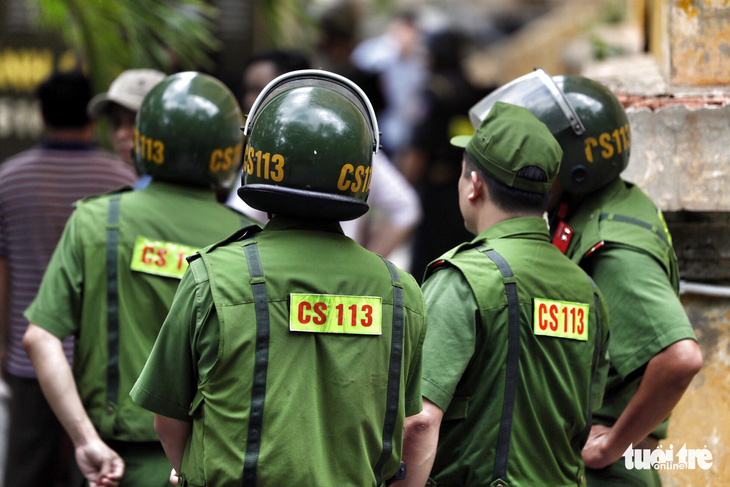 An ninh dày đặc trong buổi tuyên án nhóm khủng bố sân bay Tân Sơn Nhất - Ảnh 9.