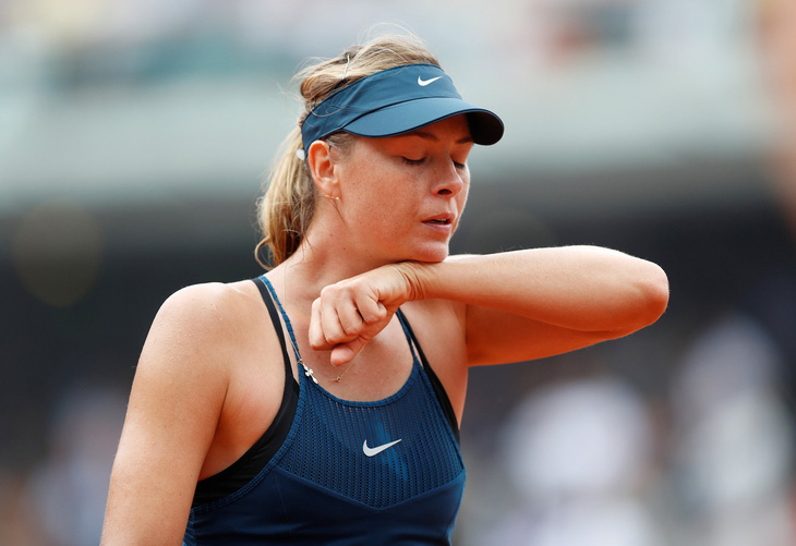 Thắng nhanh Sharapova, Muguruza gặp Halep ở bán kết Roland Garros - Ảnh 2.