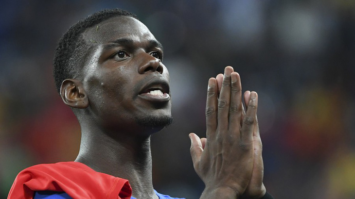 Paul Pogba tặng chiến thắng cho 12 cầu thủ nhí vừa thoát khỏi hang - Ảnh 1.