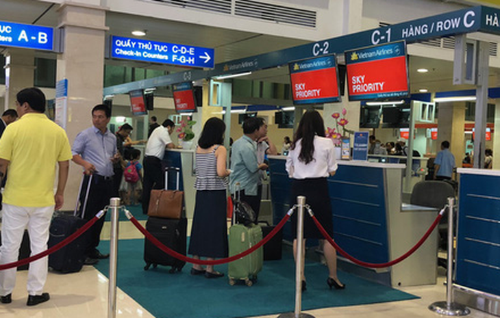 Vietnam Airlines phụ thu quản trị hệ thống, bỏ phụ thu xuất vé - Ảnh 1.