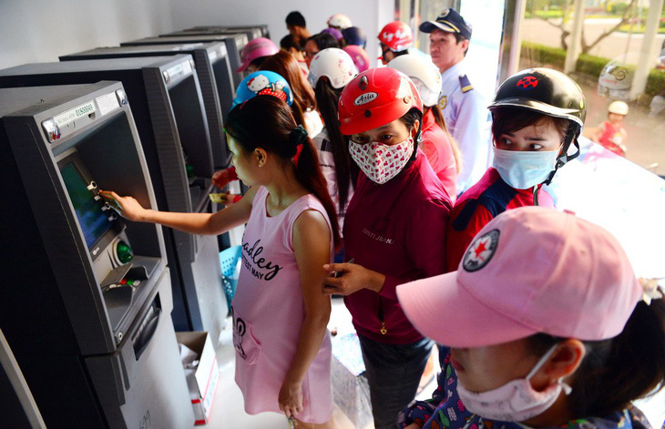 ATM liệu có ‘kẹt tiền’ dịp Tết? - Ảnh 1.