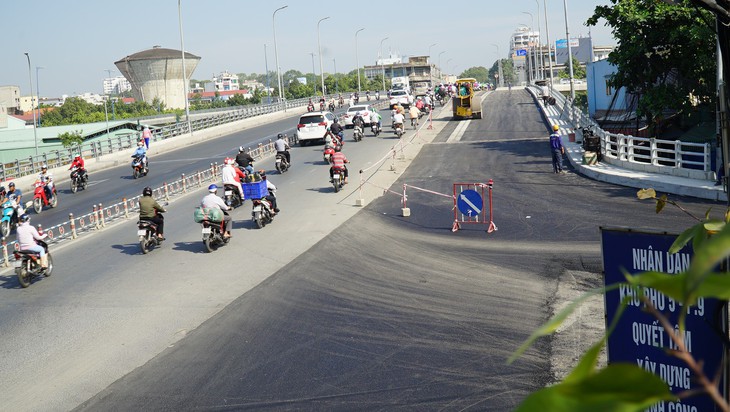 Ngày 26-1 thông xe cầu Nguyễn Tri Phương mở rộng - Ảnh 2.