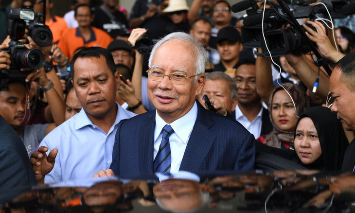 Bắc Kinh bác bỏ thông tin bắt tay ông Najib để được ủng hộ ở Biển Đông - Ảnh 1.