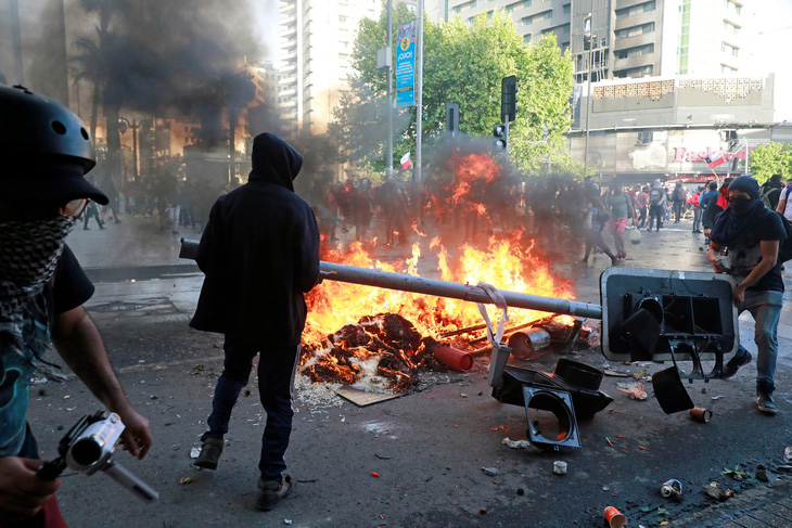 Chile tuyên bố hủy đăng cai tổ chức APEC, COP25 vì biểu tình - Ảnh 1.