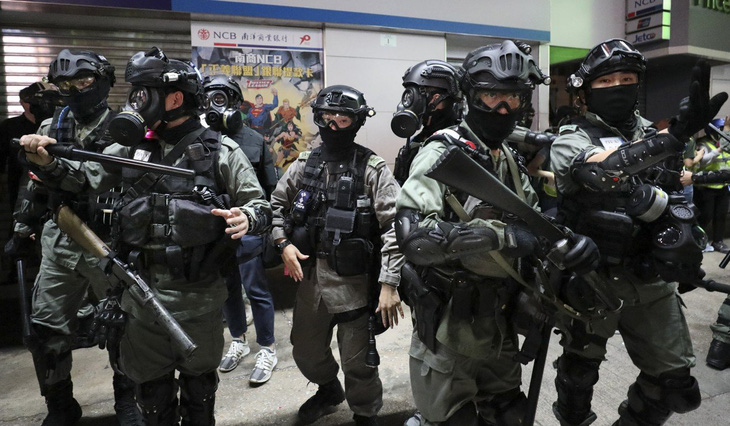 Cảnh sát quá tải, Hong Kong lập đội đặc nhiệm xử lý biểu tình - Ảnh 1.